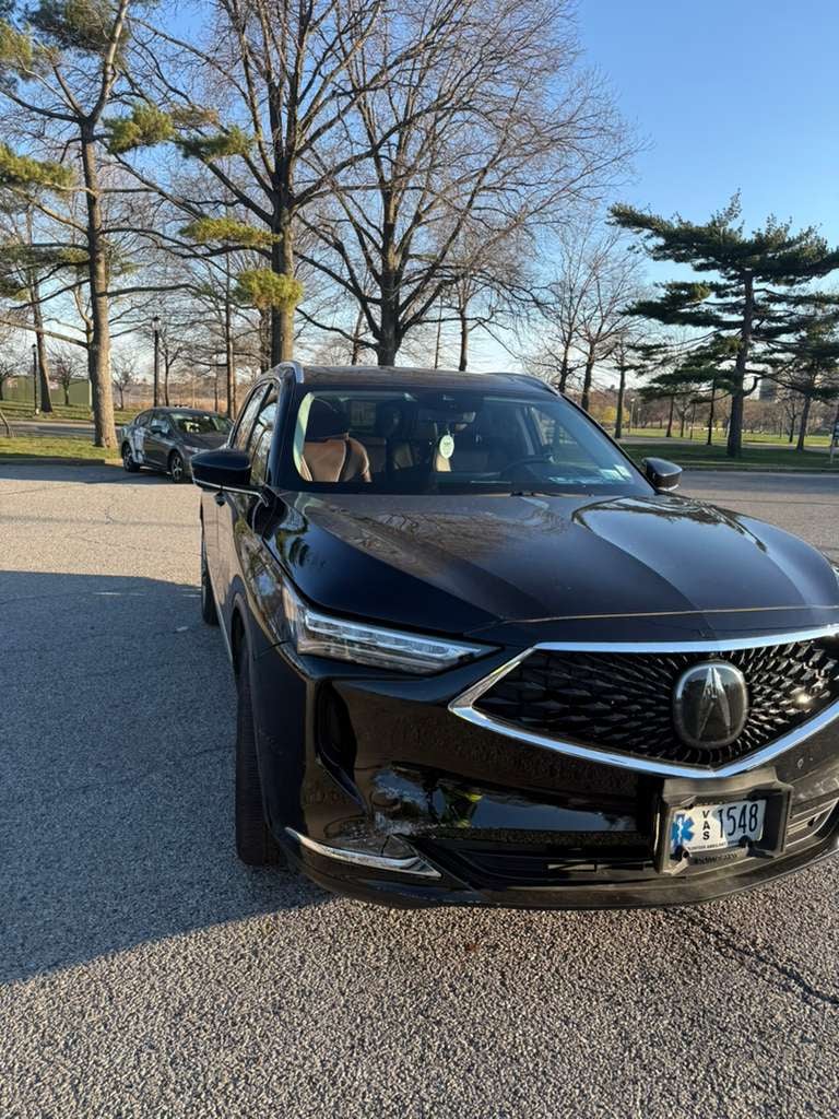 After: Acura MDX delivered at Flushing Meadows-Corona Park, Queens Acura MDX with front-end collision damage delivered to Flushing Meadows-Corona Park in Queens by JG Towing.